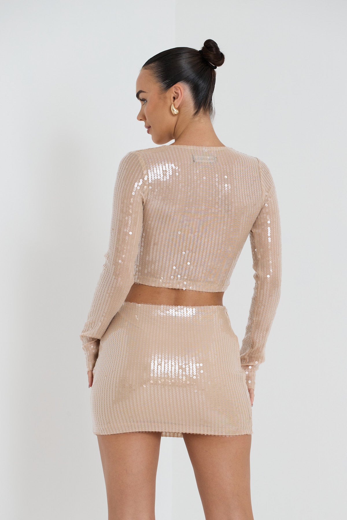 ZANDER MINI SKIRT IN NUDE GLAZE