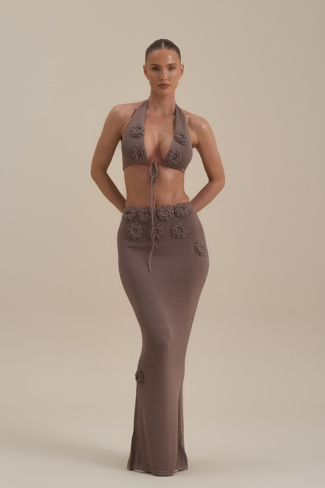 Model wearing Daisy Maxi Skirt in Mocha Mousse, front view with 3D flower appliqués - Wanderdoll