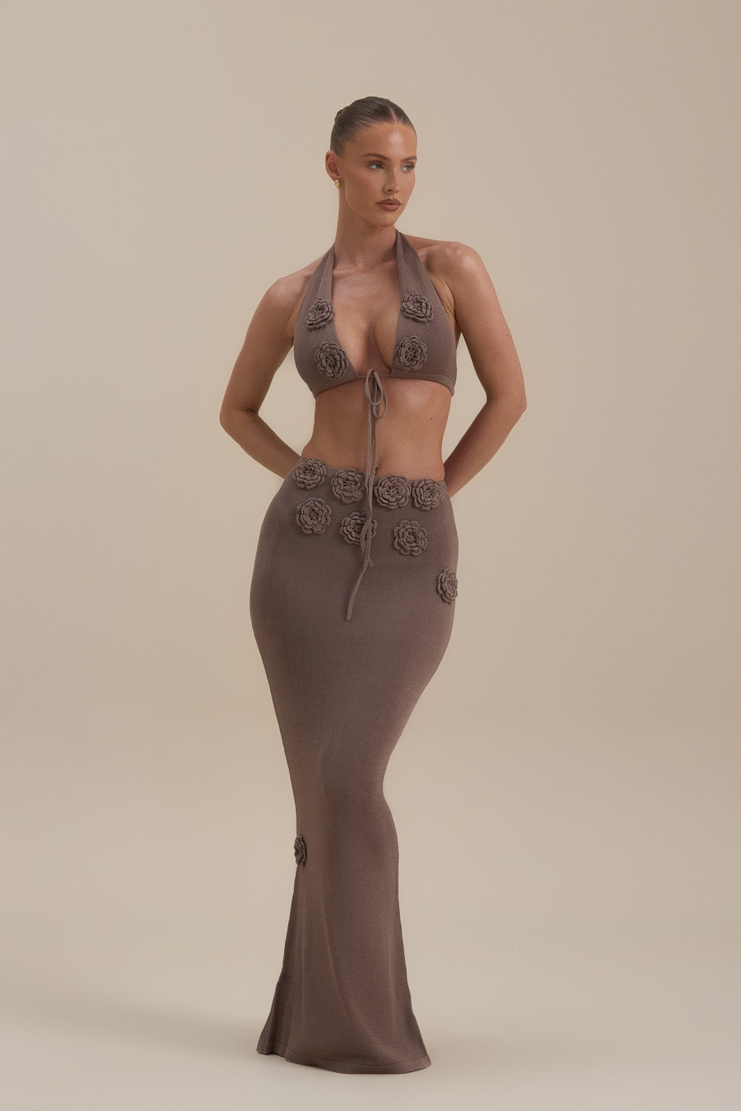 Model wearing Daisy Maxi Skirt in Mocha Mousse, front view with 3D flower appliqué - Wanderdoll