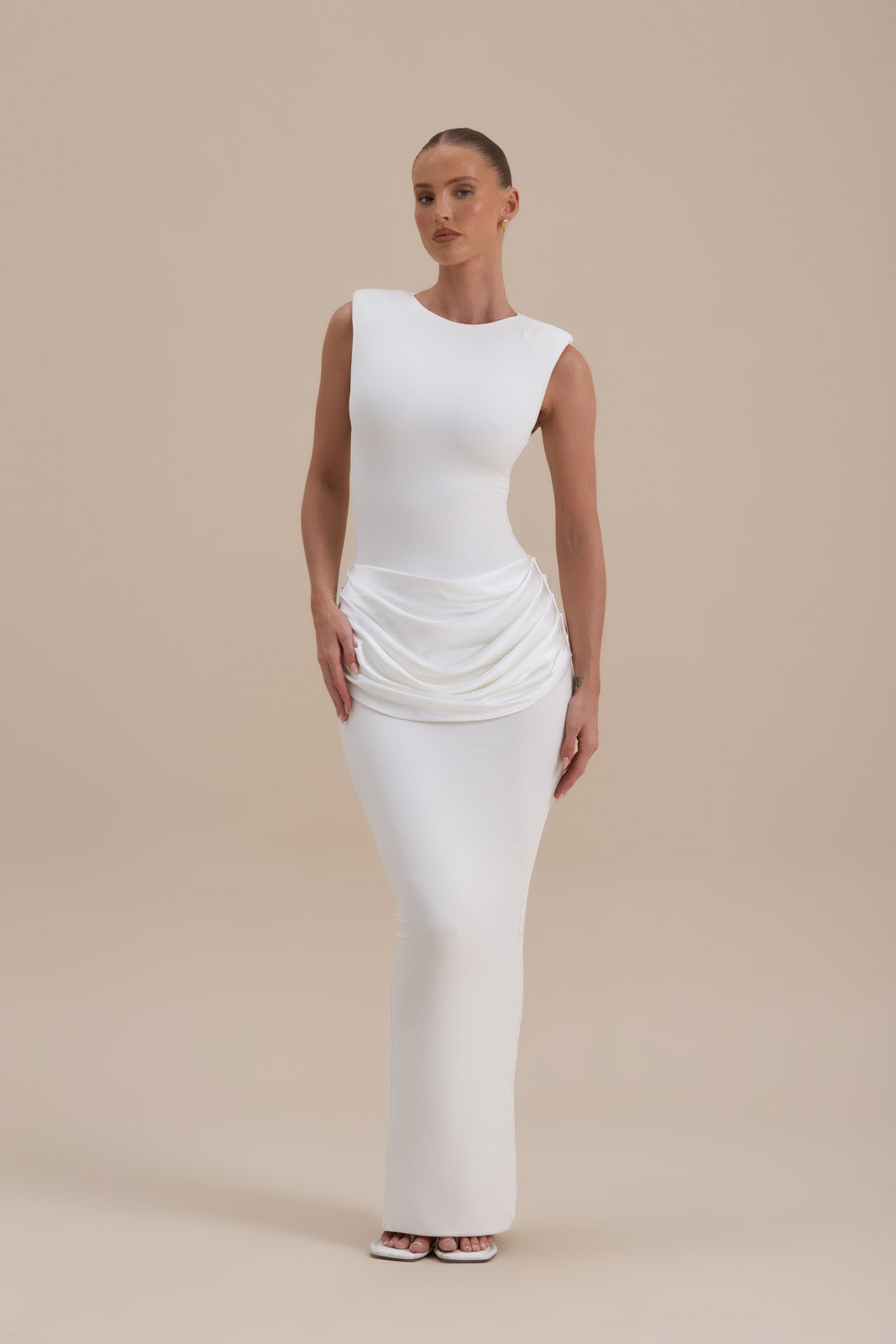 Model wearing Eman Satin Maxi Dress in White, sculpting fit in outdoor setting - Wanderdoll