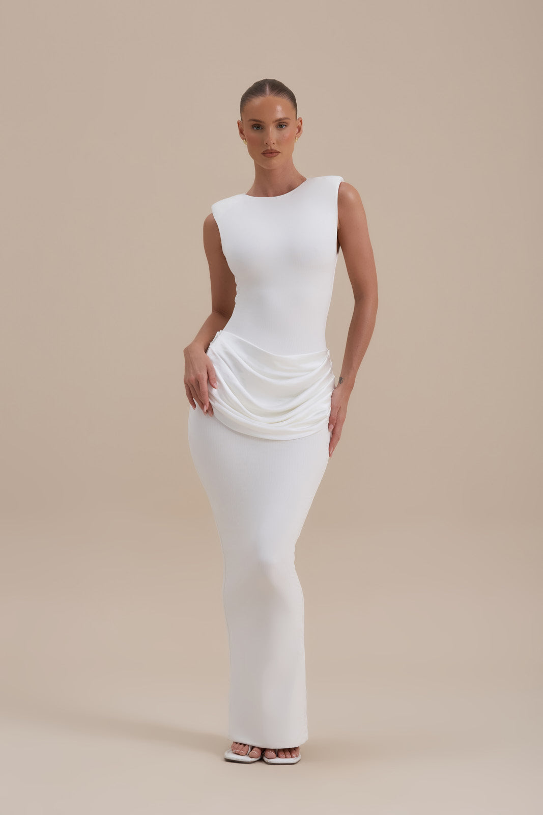 Model wearing Eman Satin Maxi Dress in White, close-up of neckline and padded shoulders - Wanderdoll