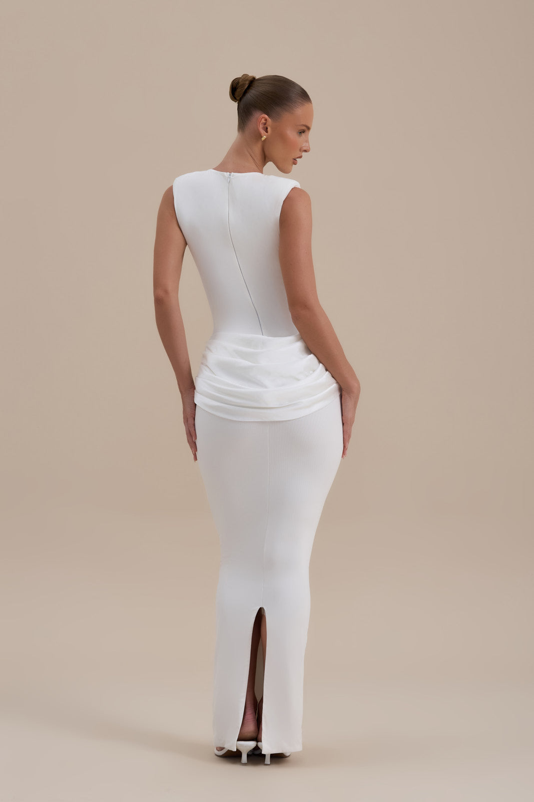 Model wearing Eman Satin Maxi Dress in White, full front view showcasing sculpting silhouette - Wanderdoll