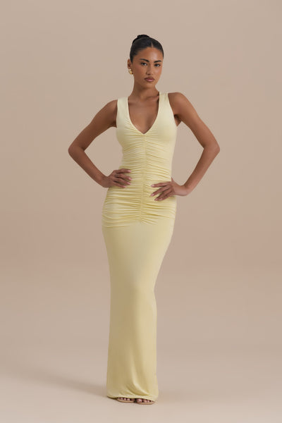Model wearing Tate Maxi Dress in Lemon, close-up of plunging neckline and ruched bodice - Wanderdoll