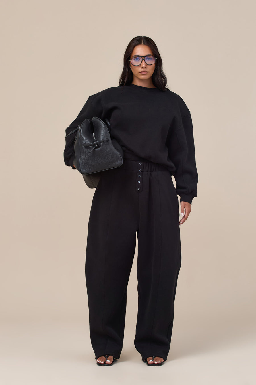 LANE BUTTON BALLOON LEG SWEATPANTS | BLACK